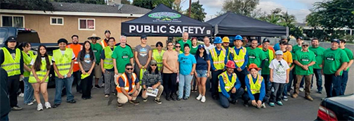 Group photo of Senator Gonzalez's team and volunteers in front of a tent with the words "Public Safety"