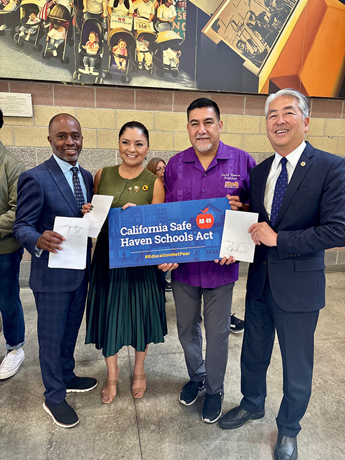 From left to right: State Superintendent of Public Instruction Tony Thurmond, Senator Lena Gonzalez, President of SEIU California and SEIU-USWW David Huerta, and Assemblymember Al Muratsuchi at AB 49 bill signing ceremony. 